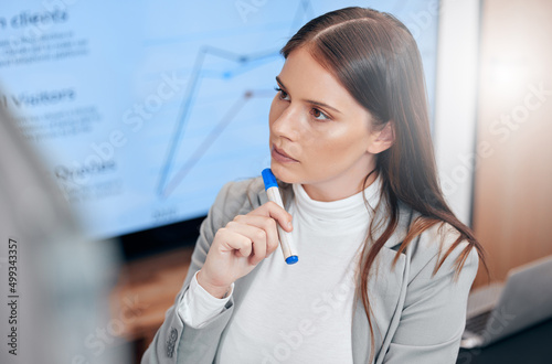 Thinking up the next big idea. Shot of a businesswoman deep in thought in a boardroom. © Kay A/peopleimages.com