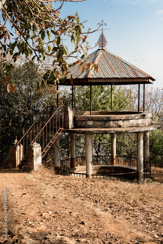 A shaded place at Shreenagar, Tansen below the Buddha statues to view the beautiful scenery of Tansen, Palpa, Nepal. photo