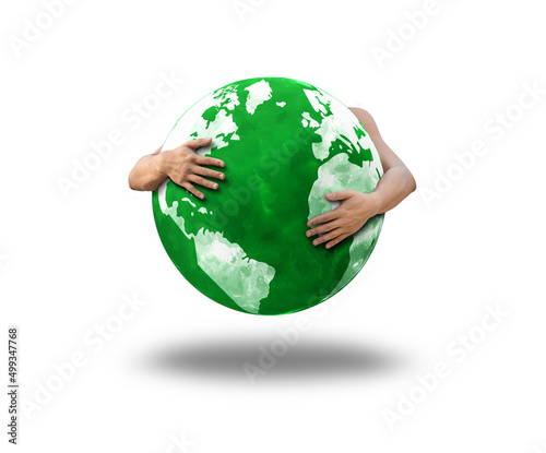 Fototapeta Naklejka Na Ścianę i Meble -  hand hugging a green globe on a isolated white background. environmental concept on earth day