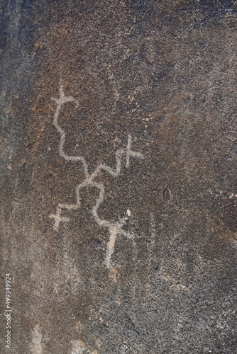 Petroglyph etched onto a rock at White Tank Regional Park in Arizona