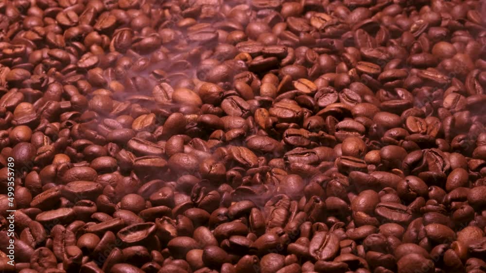Aromatic smoke comes out from roasting coffee. Aromatic smoke comes out from roasting coffee.