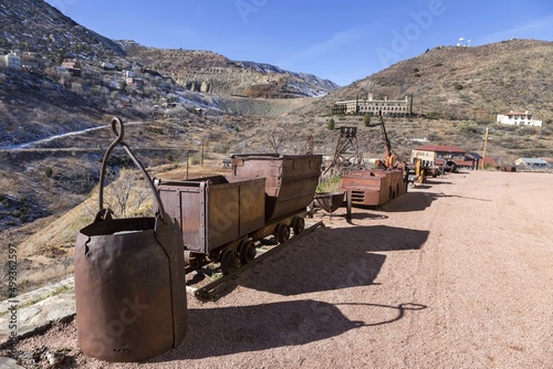 Vintage Old Rusted Mining Cart Equipment and Jerome Arizona Skyline photo