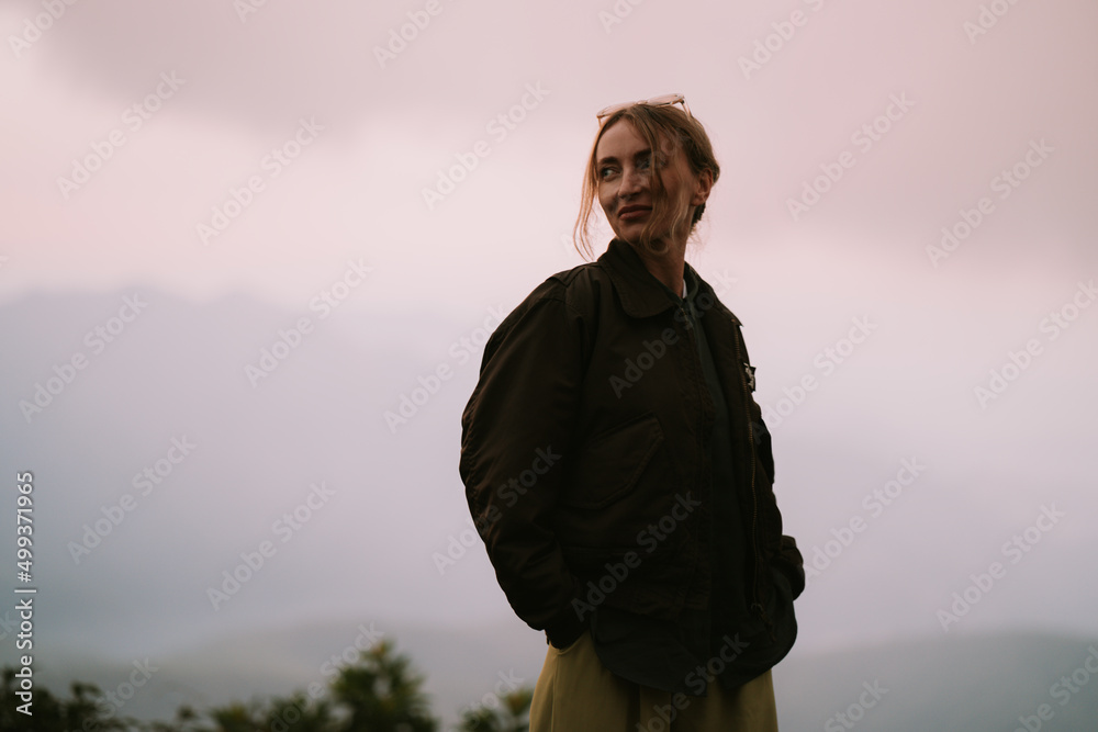 A woman in bomber jacket at Doi Inthanon National Park Thailand