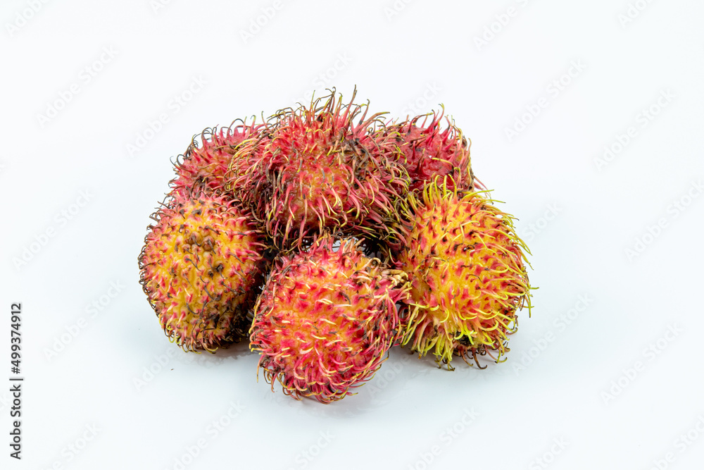 Rambutan isolated in white background - Shot in studio lights. Rambutan isolated in white background - Shot in studio lights.