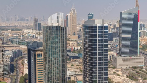 Aerial view of media city and al barsha heights district area timelapse from Dubai marina. photo