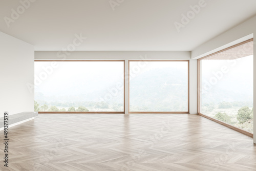 White empty hall in studio flat, panoramic window on countryside