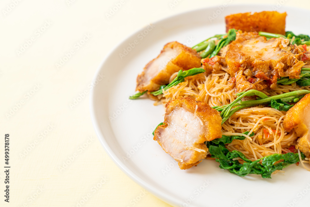 Stir-fried rice vermicelli and water mimosa with crispy pork belly Stir-fried rice vermicelli and water mimosa with crispy pork belly