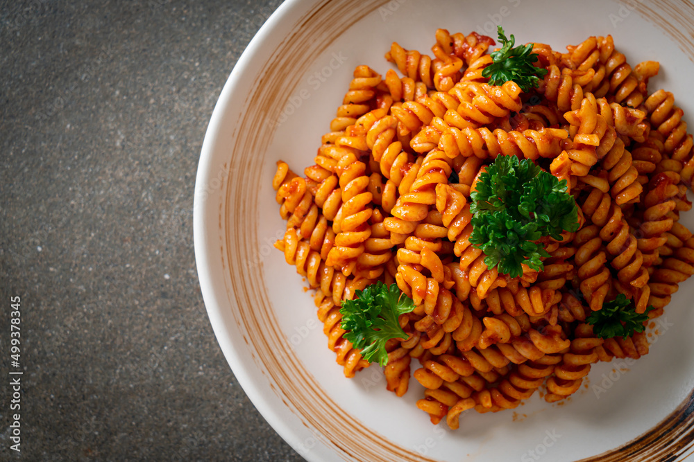 spirali or spiral pasta with tomato sauce spirali or spiral pasta with tomato sauce