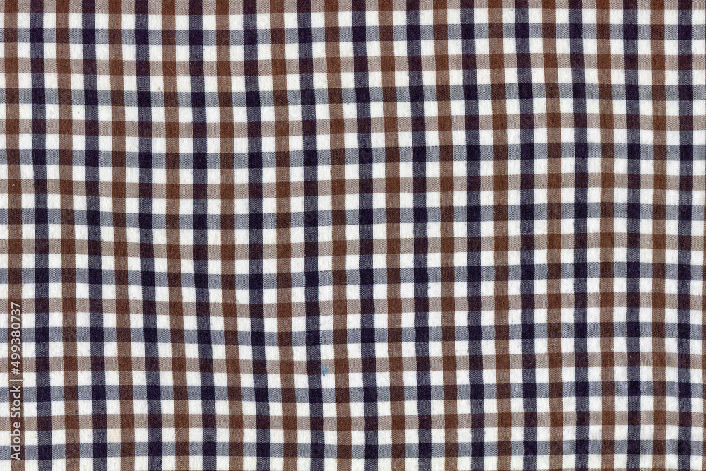 square pattern fabric background. Textures brown black and white cotton fabric. The pattern for textiles. Cell. Shirts plaid. Trendy Illustration for Wallpapers. Fashion Design square pattern fabric background. Textures brown black and white cotton fabric. The pattern for textiles. Cell. Shirts plaid. Trendy Illustration for Wallpapers. Fashion Design