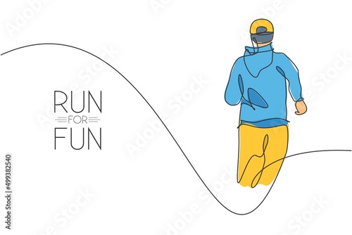 Single continuous line drawing of young agile man runner relax wearing hoodie, from rear view. Healthy sport action concept. Trendy one line draw design vector illustration for running race promotion