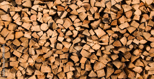 Wooden natural sawn logs as background  top view  flat lay.