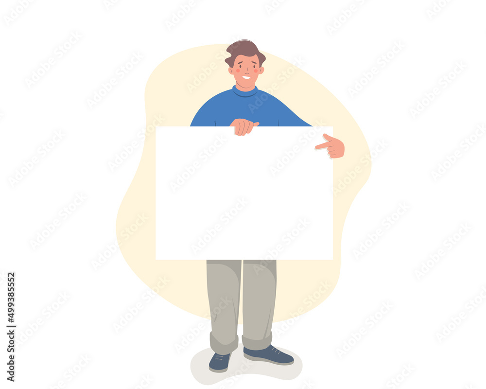 Happy young man showing and pointing blank poster as copy space Happy young man showing and pointing blank poster as copy space