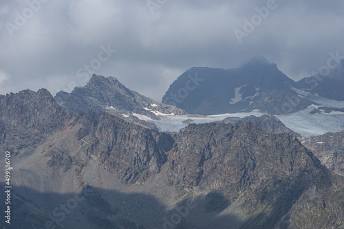 The peaks and glaciers of the Bernina group  one of the mountains of the Alps that exceeds 4000 meters  near the village of Chiesa in Valmalenco  Lombardy  Italy - September 2021.