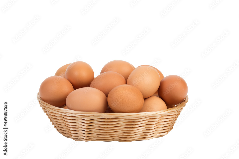 Fresh eggs in a wicker basket. Fresh eggs in a wicker basket.