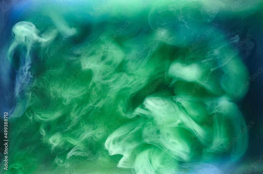 Obraz premium Blue green smoke on black ink background, colorful fog, abstract swirling ocean sea, acrylic paint pigment underwater