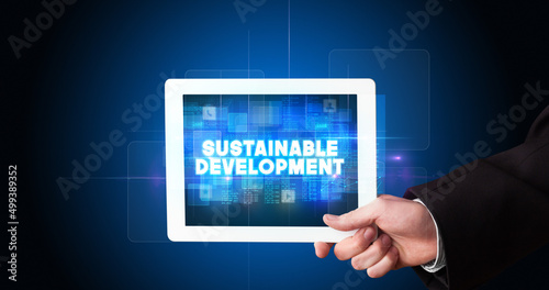 Wallpaper Mural Person holding tablet, technology concept Torontodigital.ca