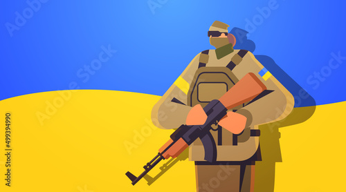 Ukrainian soldier in full body armor special forced Ukrainian defender in military cloth armed forces of Ukraine stop war