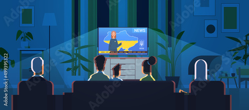 people watching live news on tv screen pray for Ukraine peace save Ukraine from russia stop war concept