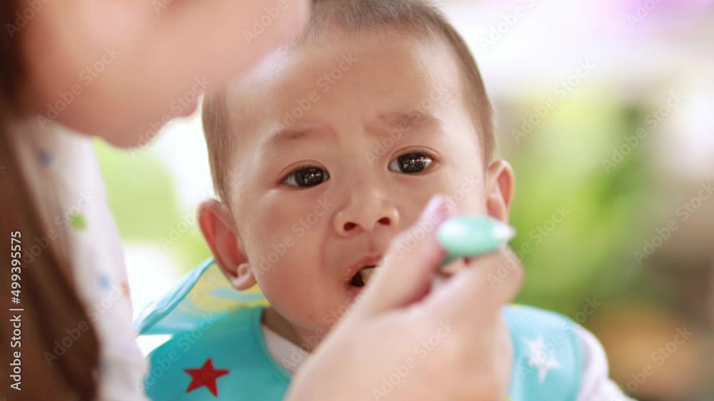 Asian babies enjoy nutritious food for the first month. Healthy baby concept. Asian babies enjoy nutritious food for the first month. Healthy baby concept.