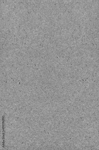 Grey natural art paper texture background, recycled craft pattern, large bright vertical vintage rustic retro album wrapping cardboard sheet, decorative spotted handmade detailed grungy wood fiber