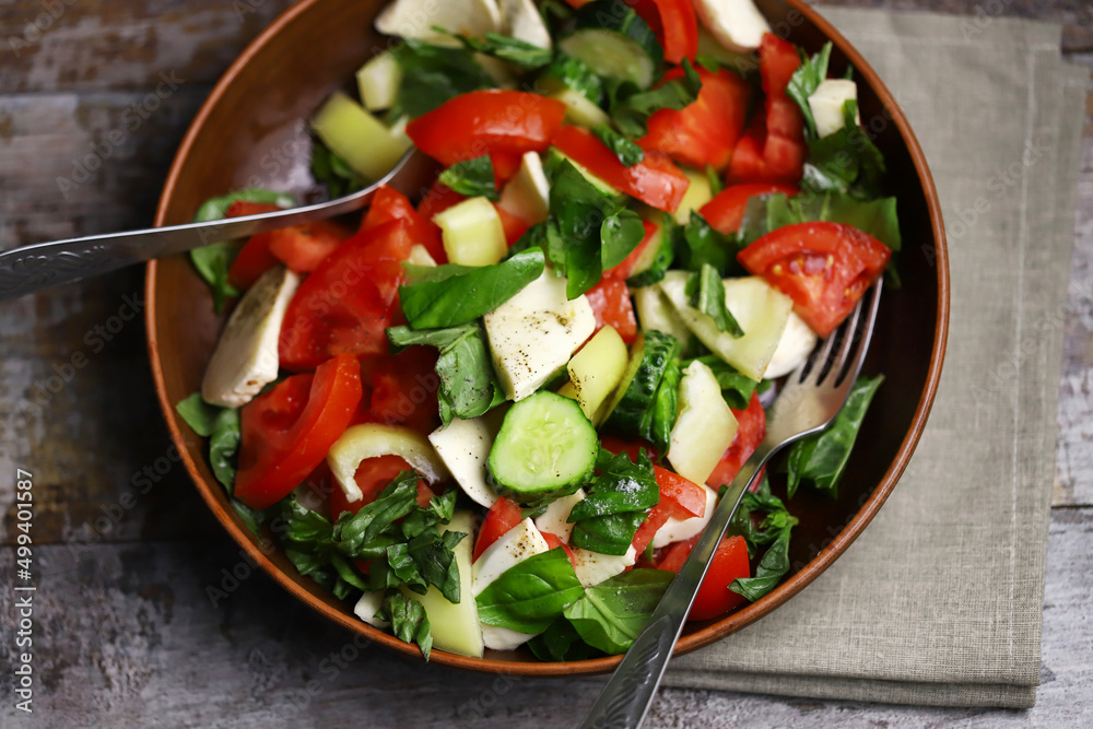 Salad with vegetables and mozzarella.