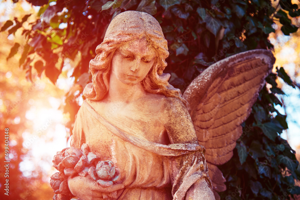 Positive, affirming image with an angel figure in sunlight. A symbol of hope, comfort, compassion and psychological help.