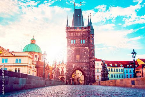 Obraz na płótnie cute fascinating mystical landscape with arch-tower on Charles Bridge in an old city in Prague, Czech Republic at dawn. amazing places. popular tourist atraction w salonie