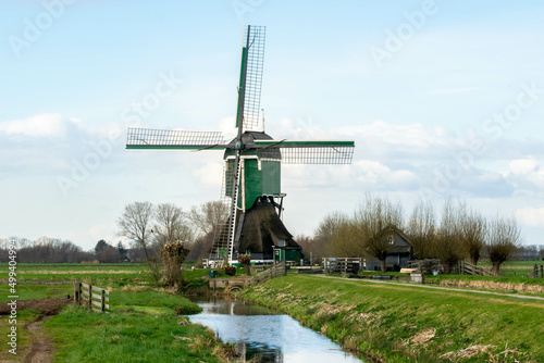 old dutch windmill at the village of Vlist in the Krimpenerwaard in the province of south holland, the Netherlands photo