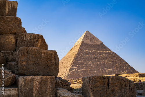 The great Pyramid of Khafra through a ruin. Photograph taken in Giza  Cairo  Egypt.