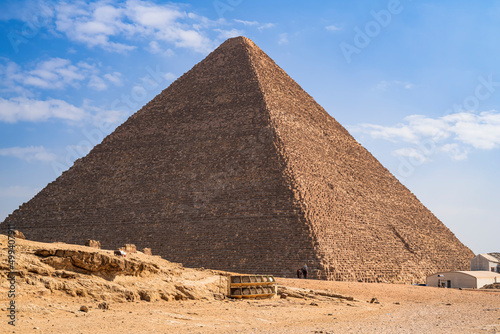 The great Pyramid of Cheops in the great expanse of the desert. Photograph taken in Giza, Cairo, Egypt.