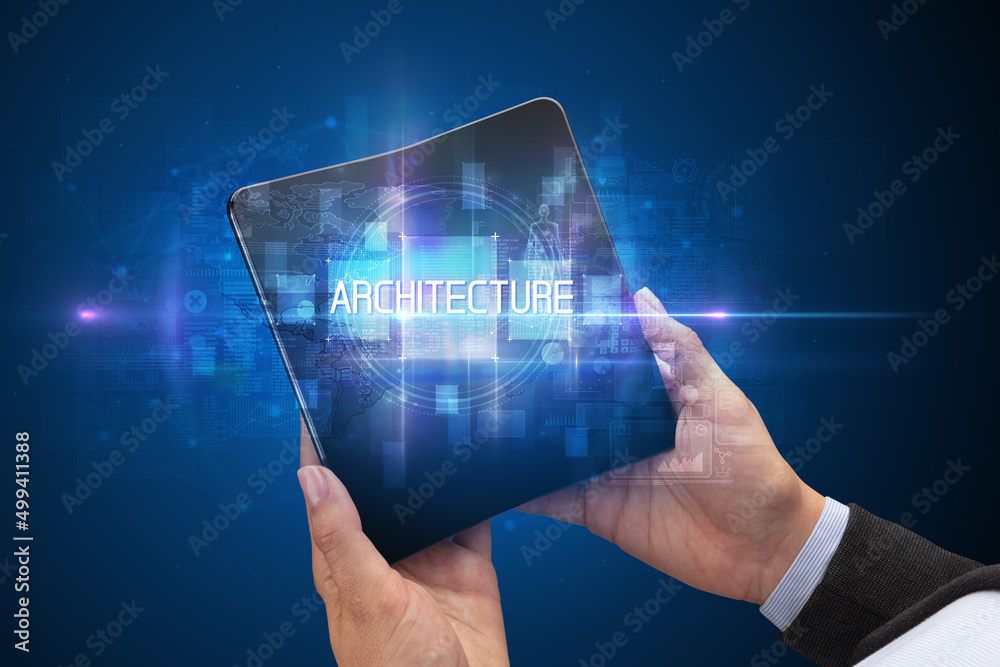 Businessman holding a foldable smartphone Businessman holding a foldable smartphone