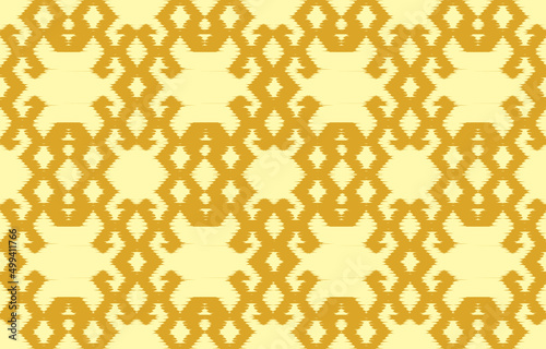 Ethnic abstract yellow. Seamless geometric pattern in tribal, folk embroidery, and Mexican style. Aztec geometric art ornament print. Design for carpet, wallpaper, clothing, wrapping, fabric, textile.