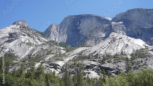 El Capitan and Half Dome granite monolith mountain peaks in the Yosemite National Park of California, USA.