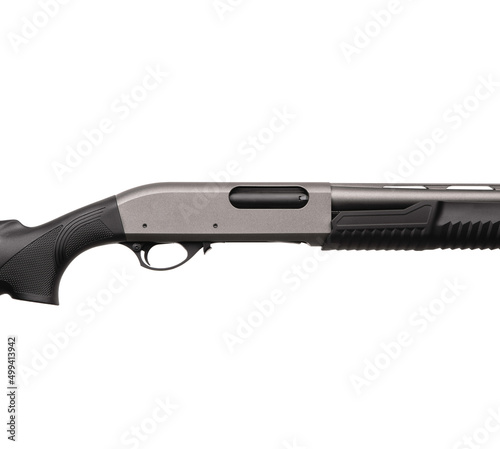Pump-action 12 gauge shotgun isolated on a white back. Close-up shot of part of a shotgun. A smooth-bore weapon with a plastic stock. © solidmaks