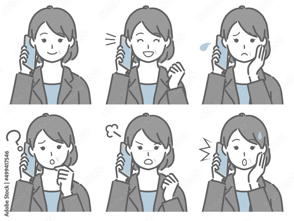スマホで話すスーツの中年女性 スマホで話すスーツの中年女性