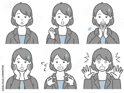 驚く表情の強弱　スーツの中年女性