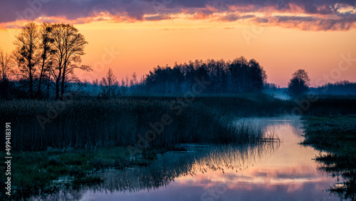 Sunrise over the wetlands. The Lasica Canal, Kampinos National Park, Poland.