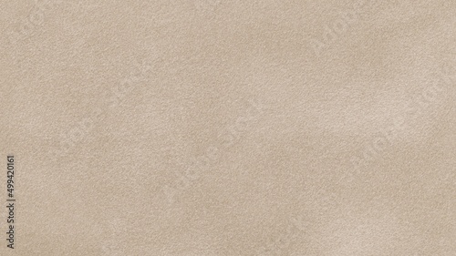 Light beige matte background of suede fabric, closeup, suede fabric photo