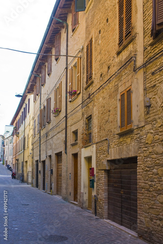 Fototapeta Naklejka Na Ścianę i Meble -  Street with historical old buildings in downtown of Pesaro
