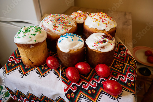 Easter sweet bread Orthodox kulich, paska and painted eggs. Prepearing for traditional Easter in Ukraine. photo