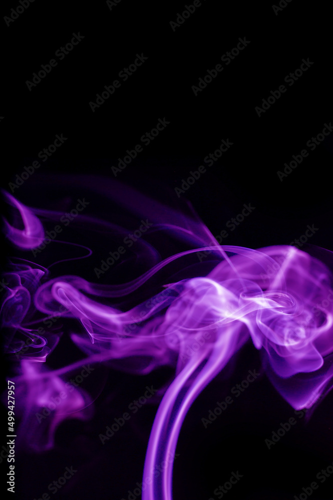 Purple smoke on black background Purple smoke on black background
