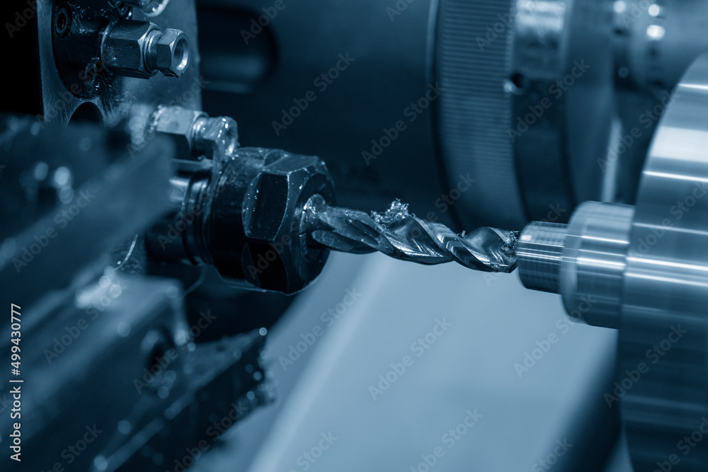 The CNC lathe machine bore cutting the brass pipe connector parts. The CNC lathe machine bore cutting the brass pipe connector parts.