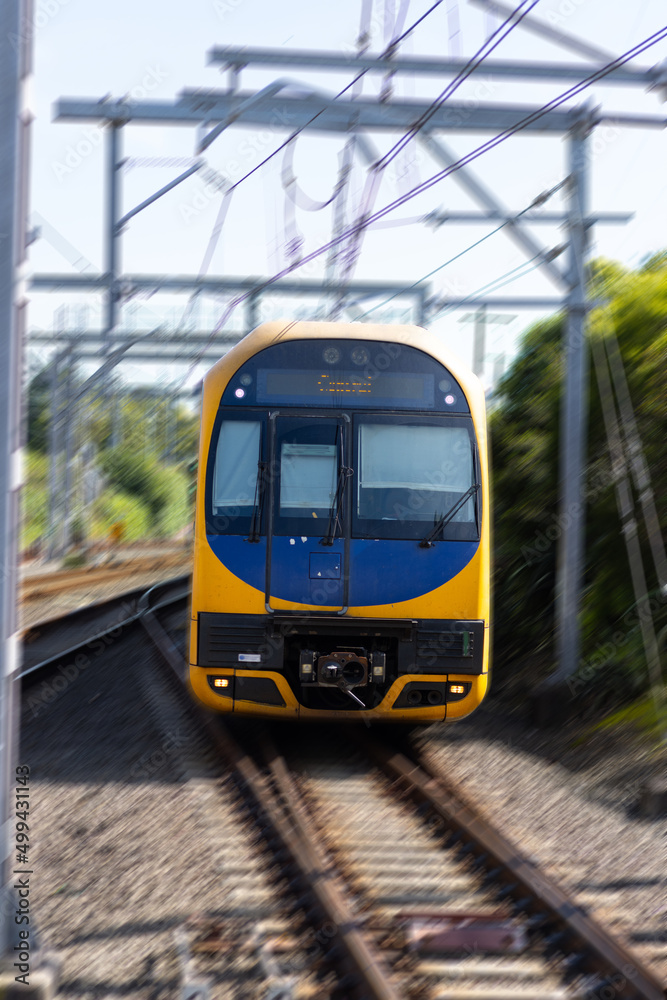 Naklejka premium Commuter train approaching a train station in Sydney NSW Australia