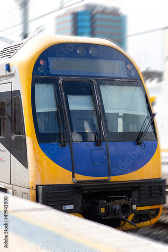 Commuter train approaching a train station in Sydney NSW Australia