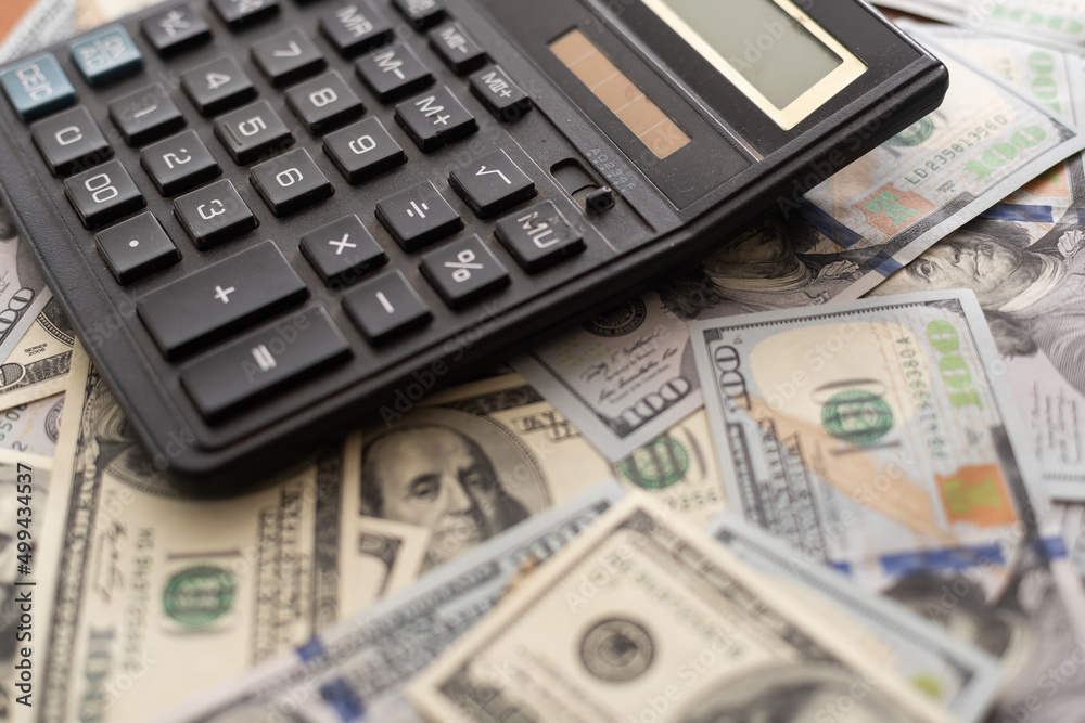 Background from 100 dollar bills. Wealth and success concept. Background from 100 dollar bills. Wealth and success concept.