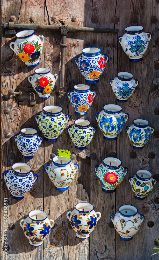 Colorful, ceramic pots exposed for sale in Frigiliana, Spain. 'Oferta' means 'sale' in Spanish