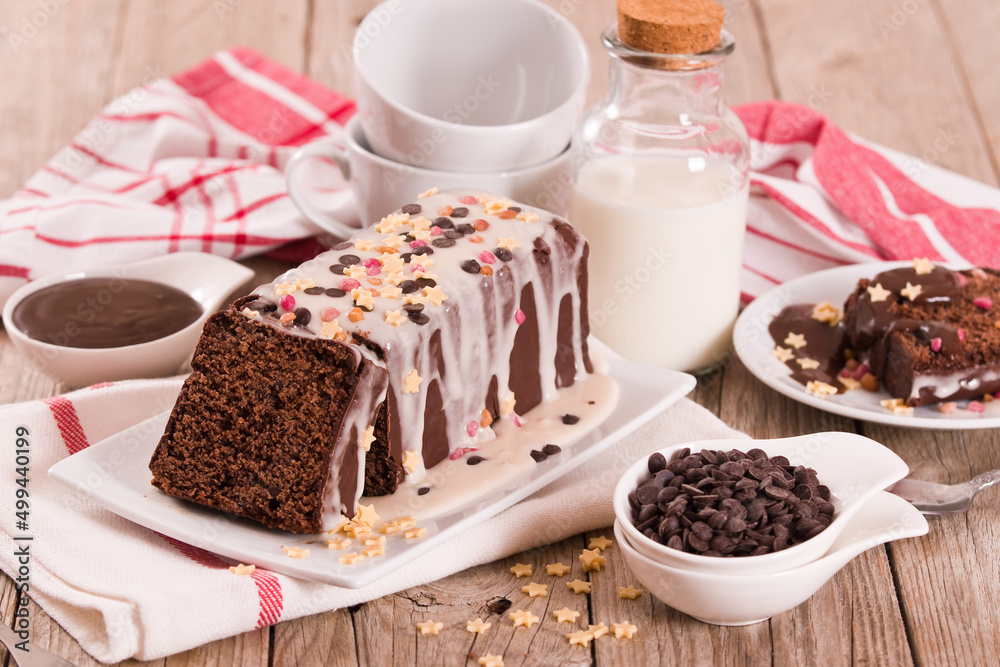 Sponge cake with white frosting and sugars. Sponge cake with white frosting and sugars.