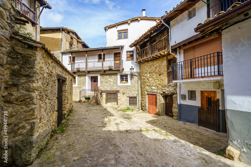 Set of old stone houses in the mountain village of Candelario Salamanca. photo