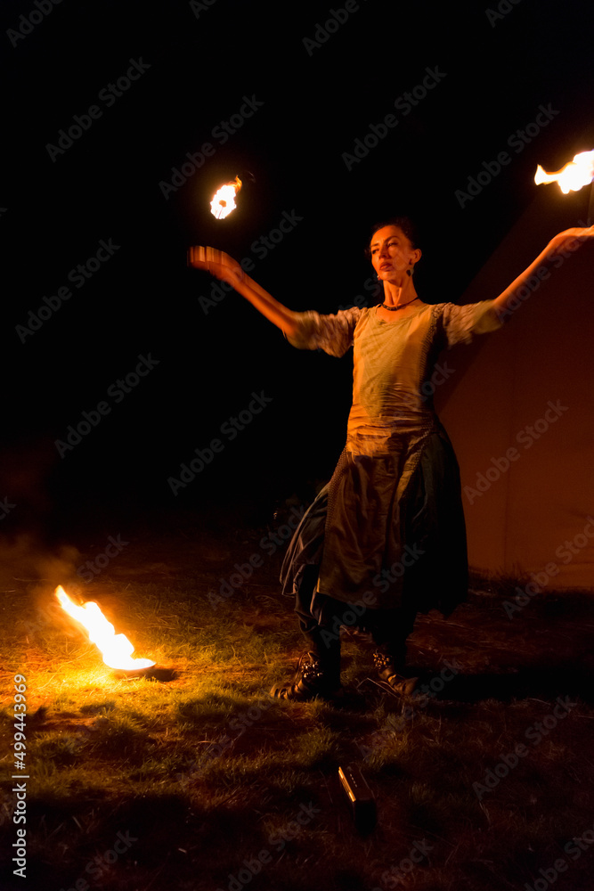 woman with fire in her hands