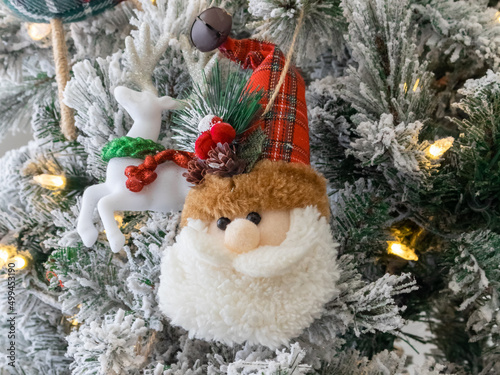 Santa Claus fur head on a Christmas tree